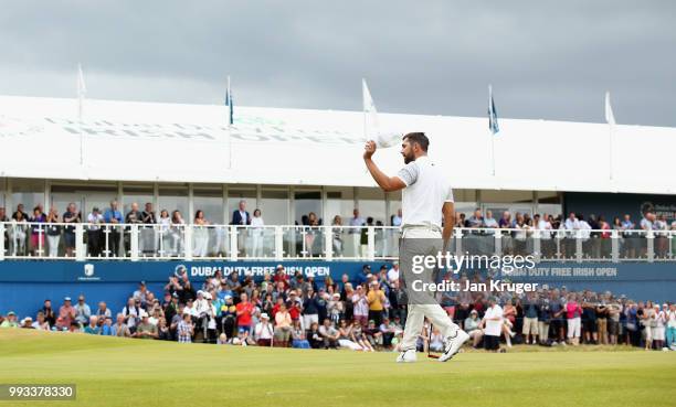 Erik van Rooyen of South Africa waves to the crowd on the 18th hole during the third round of the Dubai Duty Free Irish Open at Ballyliffin Golf Club...