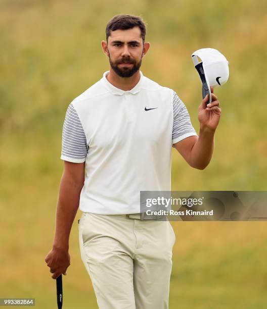 Erik van Rooyen of South Africa waves to the crowd on the 18th hole during the third round of the Dubai Duty Free Irish Open at Ballyliffin Golf Club...