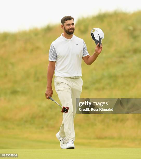 Erik van Rooyen of South Africa waves to the crowd on the 18th hole during the third round of the Dubai Duty Free Irish Open at Ballyliffin Golf Club...