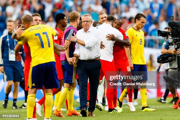 Coach Janne Andersson of Sweden looks dejected as he shakes hands with his players the 2018 FIFA World Cup Russia Quarter Final match between Sweden...