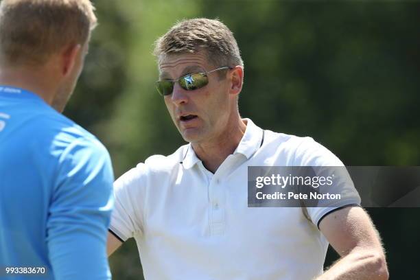 Northampton Town manager Dean Austin makes a point to David Cornell players during the pre-season friendly match between St Albans City and...