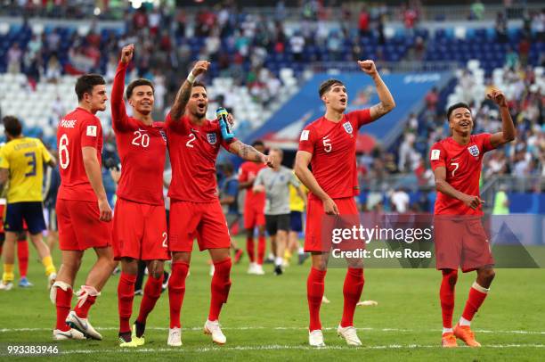 Dele Alli, Kyle Walker, John Stones, and Jesse Lingard of England celebrate following their sides victory in the 2018 FIFA World Cup Russia Quarter...