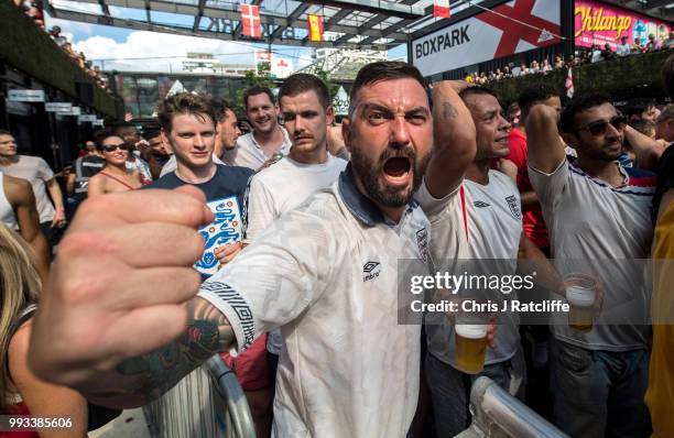 England football fans celebrate after England score their second goal in the England V Sweden quater final match in the FIFA 2018 World Cup Finals at...