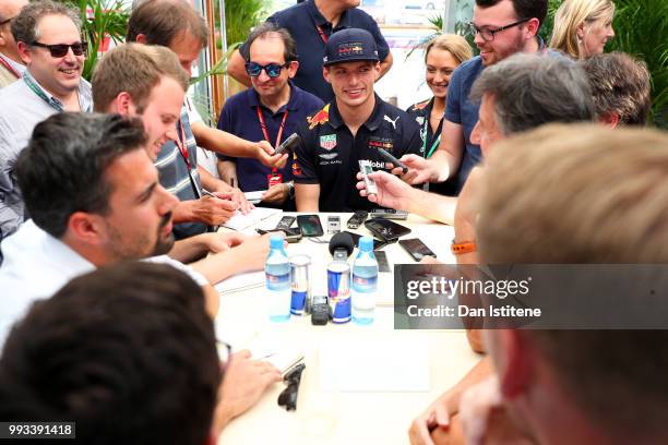 Max Verstappen of Netherlands and Red Bull Racing talks to the media after qualifying for the Formula One Grand Prix of Great Britain at Silverstone...