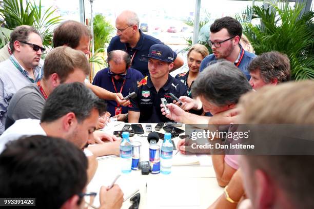 Max Verstappen of Netherlands and Red Bull Racing talks to the media after qualifying for the Formula One Grand Prix of Great Britain at Silverstone...