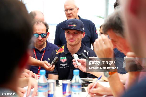 Max Verstappen of Netherlands and Red Bull Racing talks to the media after qualifying for the Formula One Grand Prix of Great Britain at Silverstone...