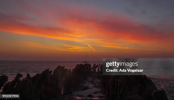 sunrise at the coast of baarland - ada imagens e fotografias de stock