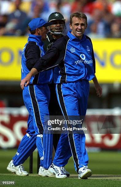 Inzamam-ul-Haq of Pakistan is held back by Alec Stewart of England after having a run in with Dominic Cork during the Natwest one day series match...