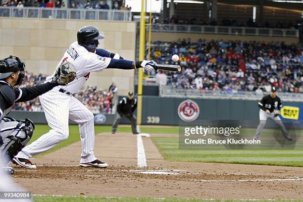 Orlando Hudson of the Minnesota Twins bunts against the Chicago White Sox on May 12, 2010 at Target Field in Minneapolis, Minnesota. The Twins won...