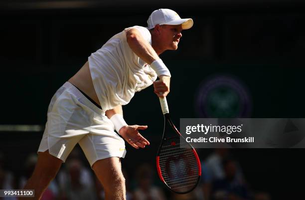 Kyle Edmund of Great Britain serves against Novak Djokovic of Serbia during their Men's Singles third round match on day six of the Wimbledon Lawn...