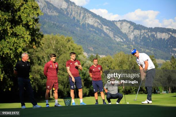 Philip Golding of England, Jarmo Sandelin of Sweden, Paul Eales of England, Jordan Hugill, Mark Noble and Aaron Cresswell of West Ham United gather...