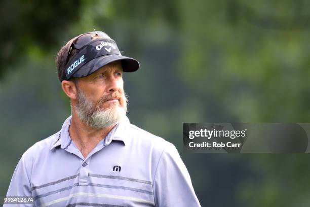 Stuart Appleby of Australia walks off the ninth tee during round one of A Military Tribute At The Greenbrier held at the Old White TPC course on July...