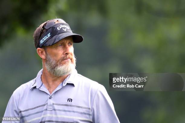 Stuart Appleby of Australia walks off the ninth tee during round one of A Military Tribute At The Greenbrier held at the Old White TPC course on July...