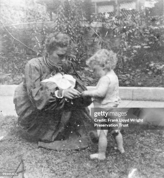 Llewellyn Wright and Catherine Tobin Wright in front of Home, at the Frank Lloyd Wright Home and Studio, located at 951 Chicago Avenue, Oak Park,...