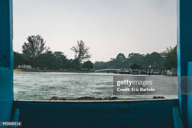 ferry to pulau ubin - bartolo stock pictures, royalty-free photos & images