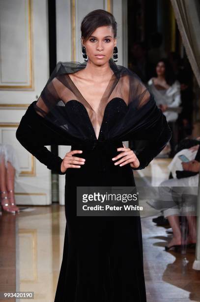 Cindy Bruna walks the runway during the Giorgio Armani Prive Haute Couture Fall Winter 2018/2019 show as part of Paris Fashion Week on July 3, 2018...