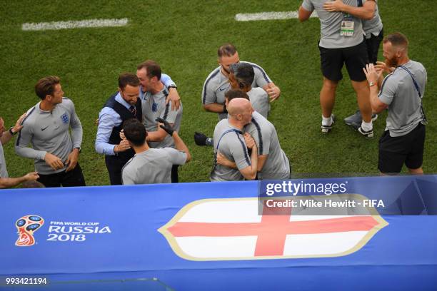 Gareth Southgate, Manager of England celebrates with his staff following England's victory in the 2018 FIFA World Cup Russia Quarter Final match...