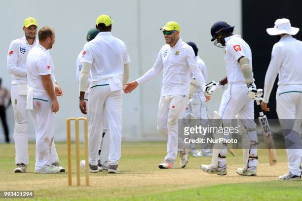 South African cricketers celebrate after taking a wicket during the first day of their Tour match against Sri Lanka Board XI at Colombo, Sri Lanka on...