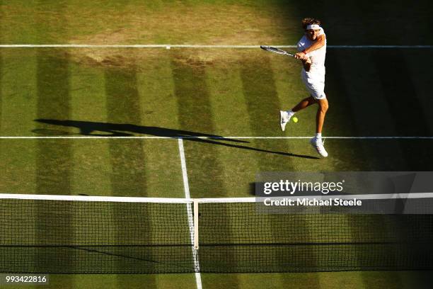 Alexander Zverev of Germany plays a shot against Ernests Gulbis of Latvia during their Men's Singles third round match on day six of the Wimbledon...