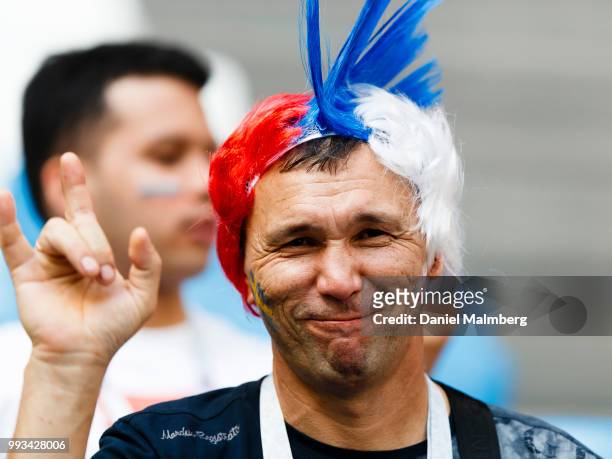 Russian fan with both the Swedish and the English flags on his cheeks ahead of the 2018 FIFA World Cup Russia Quarter Final match between Sweden and...