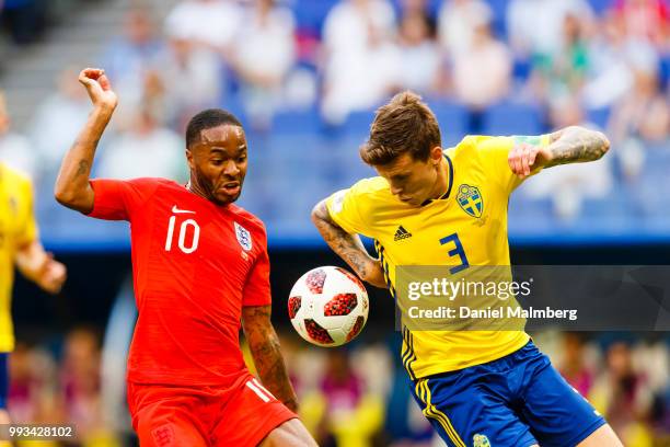 Raheem Sterling of England and Victor Lindelof of Sweden focused on the ball during the 2018 FIFA World Cup Russia Quarter Final match between Sweden...