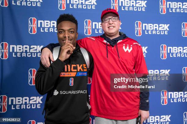 Idrisdagoat6 of Knicks Gaming and Boo Painter of the Wizards District Gaming celebrate as they both scored a successful triple double on July 7, 2018...