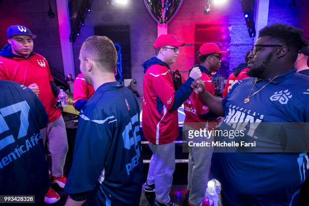The Wizards District Gaming gives daps to the Grizz Gaming after the game on July 7, 2018 at the NBA 2K Studio in Long Island City, New York. NOTE TO...