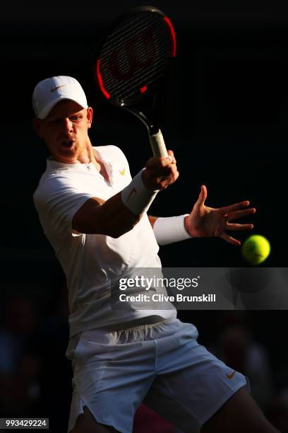 Kyle Edmund of Great Britain returns a shot against Novak Djokovic of Serbia during their Men's Singles third round match on day six of the Wimbledon...