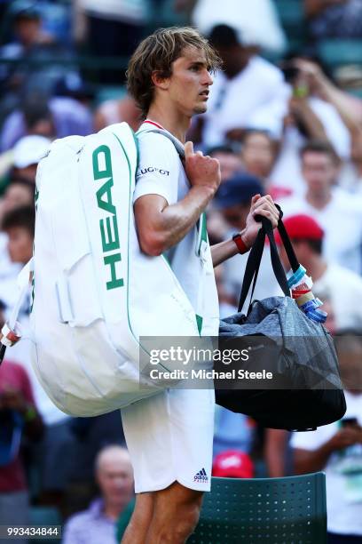 Alexander Zverev of Germany walks off the court after losing to Ernests Gulbis of Latvia in their Men's Singles third round match on day six of the...