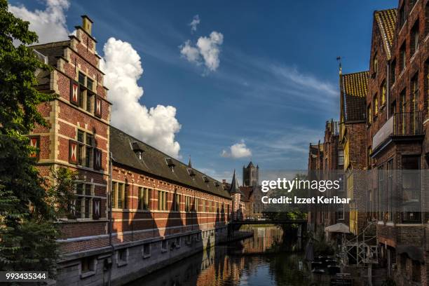 old traditional architecture, brick buildings and houses, canal  in ghent, flanders, belgium. - oost vlaanderen stock pictures, royalty-free photos & images