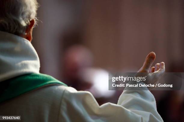 saint-jacques church.  catholic mass.  eucharist celebration.  sallanches. france. - catholicism stock-fotos und bilder