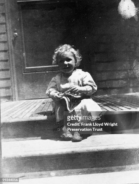 Llewellyn Wright on front steps of home, at the Frank Lloyd Wright Home and Studio, located at 951 Chicago Avenue, Oak Park, Illinois, 1905.