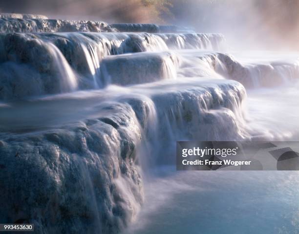 cascate del mulino, hot springs, travertine pools, saturnia, maremma, tuscany, italy - calcification stock pictures, royalty-free photos & images