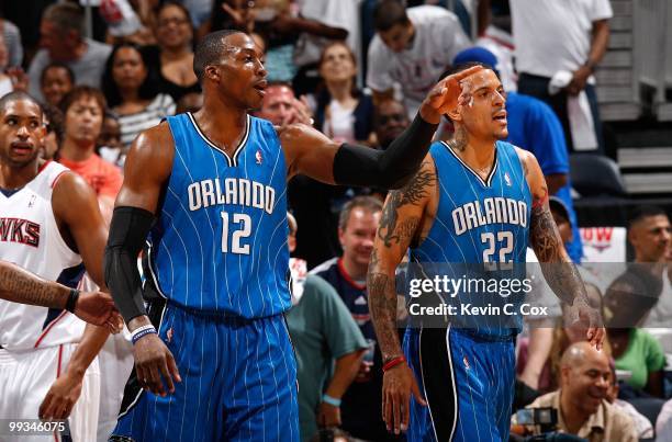 Dwight Howard and Matt Barnes of the Orlando Magic against the Atlanta Hawks during Game Three of the Eastern Conference Semifinals during the 2010...