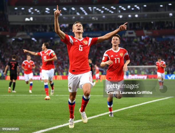 Denis Cheryshev of Russia celebrates after scoring his team's first goal during the 2018 FIFA World Cup Russia Quarter Final match between Russia and...