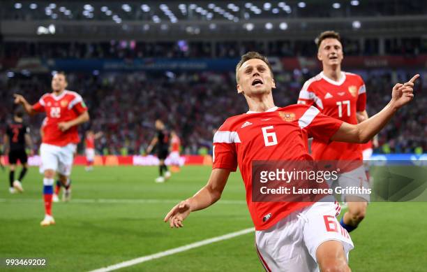 Denis Cheryshev of Russia celebrates after scoring his team's first goal during the 2018 FIFA World Cup Russia Quarter Final match between Russia and...