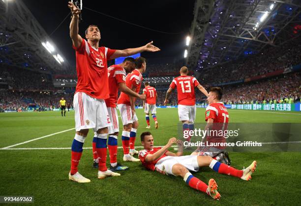 Denis Cheryshev of Russia celebrates with team mates after scoring his team's first goal during the 2018 FIFA World Cup Russia Quarter Final match...