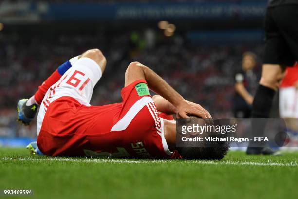 Alexander Samedov of Russia goes down injured during the 2018 FIFA World Cup Russia Quarter Final match between Russia and Croatia at Fisht Stadium...