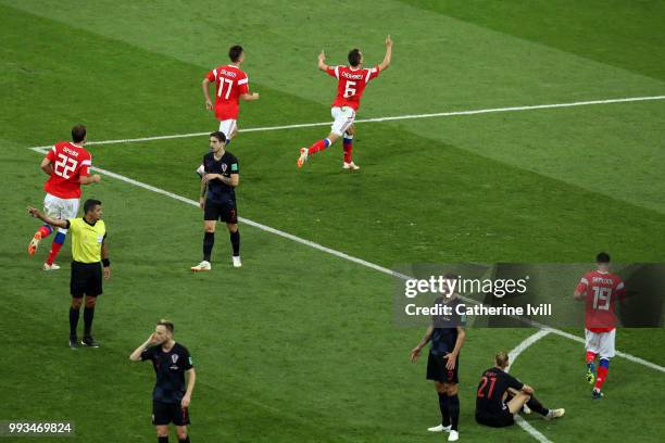 Denis Cheryshev of Russia celebrates with team mates after scoring his team's first goal during the 2018 FIFA World Cup Russia Quarter Final match...