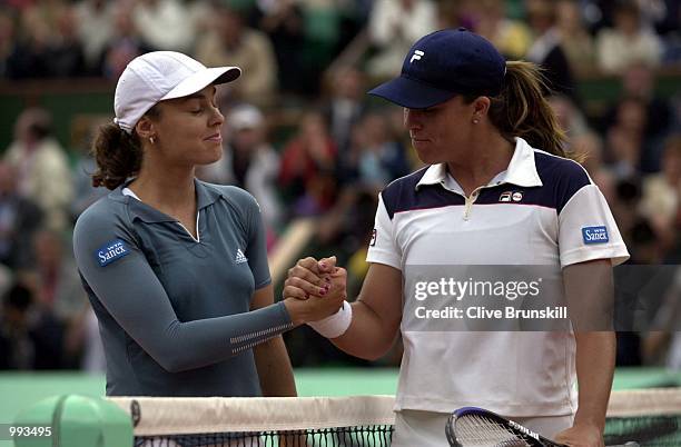 Jennifer Capriati of the USA is congratulated after winning her Semi final match against Martina Hingis of Switzerland during the French Open Tennis...