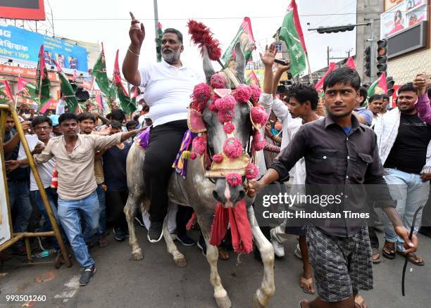 Jan Adhikar Party chief Rajesh Ranjan alias Pappu Yadav addresses party workers during a rally organised as part of 'Bihar Bandh' demanding for grant...