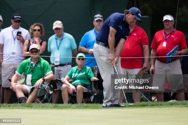 Phil Mickelson chips onto the 11th green during round three of A Military Tribute At The Greenbrier held at the Old White TPC course on July 7, 2018...
