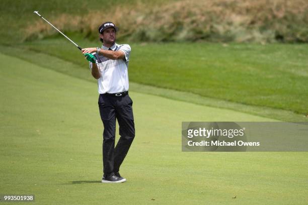 Bubba Watson hits his second shot on the 11th hole during round three of A Military Tribute At The Greenbrier held at the Old White TPC course on...