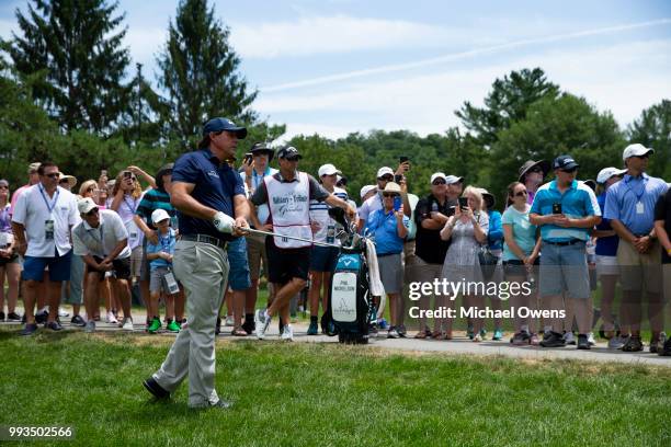 Phil Mickelson hits his second shot on the 11th hole during round three of A Military Tribute At The Greenbrier held at the Old White TPC course on...