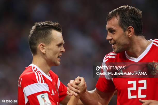 Denis Cheryshev of Russia celebrates scoring a goal to make it 1-0 with Artem Dzyuba of Russia during the 2018 FIFA World Cup Russia Quarter Final...