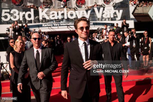 British actor Robert Pattinson poses at the red carpet during the closing of the 53rd Karlovy Vary International Film Festival in Karlovy Vary on...