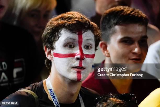 Lone England fan stands amongst thousands of Russian supporters as they cheer on their team at the Samara FIFA fanfest on July 7, 2018 in Samara,...