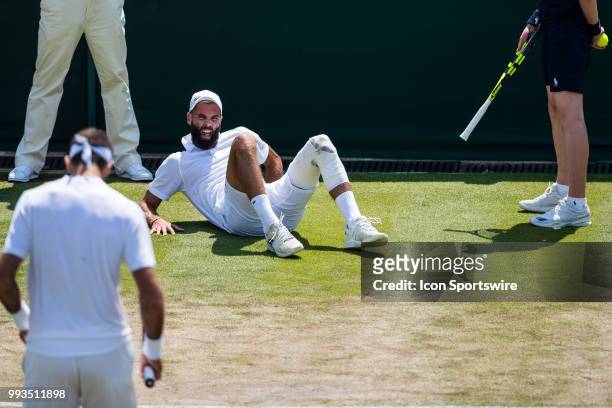 And BENOIT PAIRE during a day six match of the 2018 Wimbledon on July 7 at All England Lawn Tennis and Croquet Club in London, England.