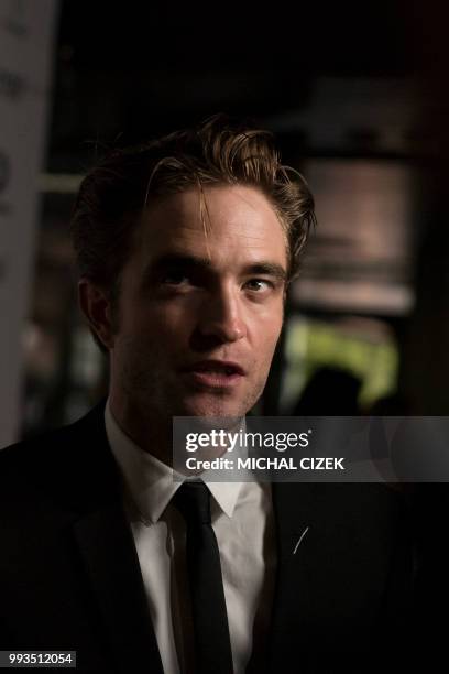 British actor Robert Pattinson gives an interview during the closing ceremony of the 53rd Karlovy Vary International Film Festival in Karlovy Vary on...