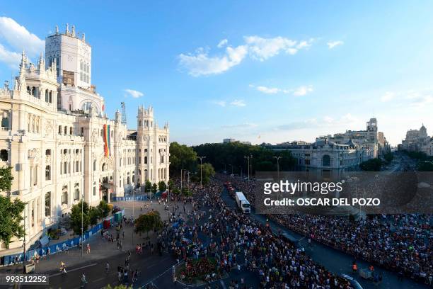 Revellers gather in front the Cibeles Palace, Madrid's City Hall, during the Gay Pride 2018 parade in Madrid, on July 7 one of the world's biggest.